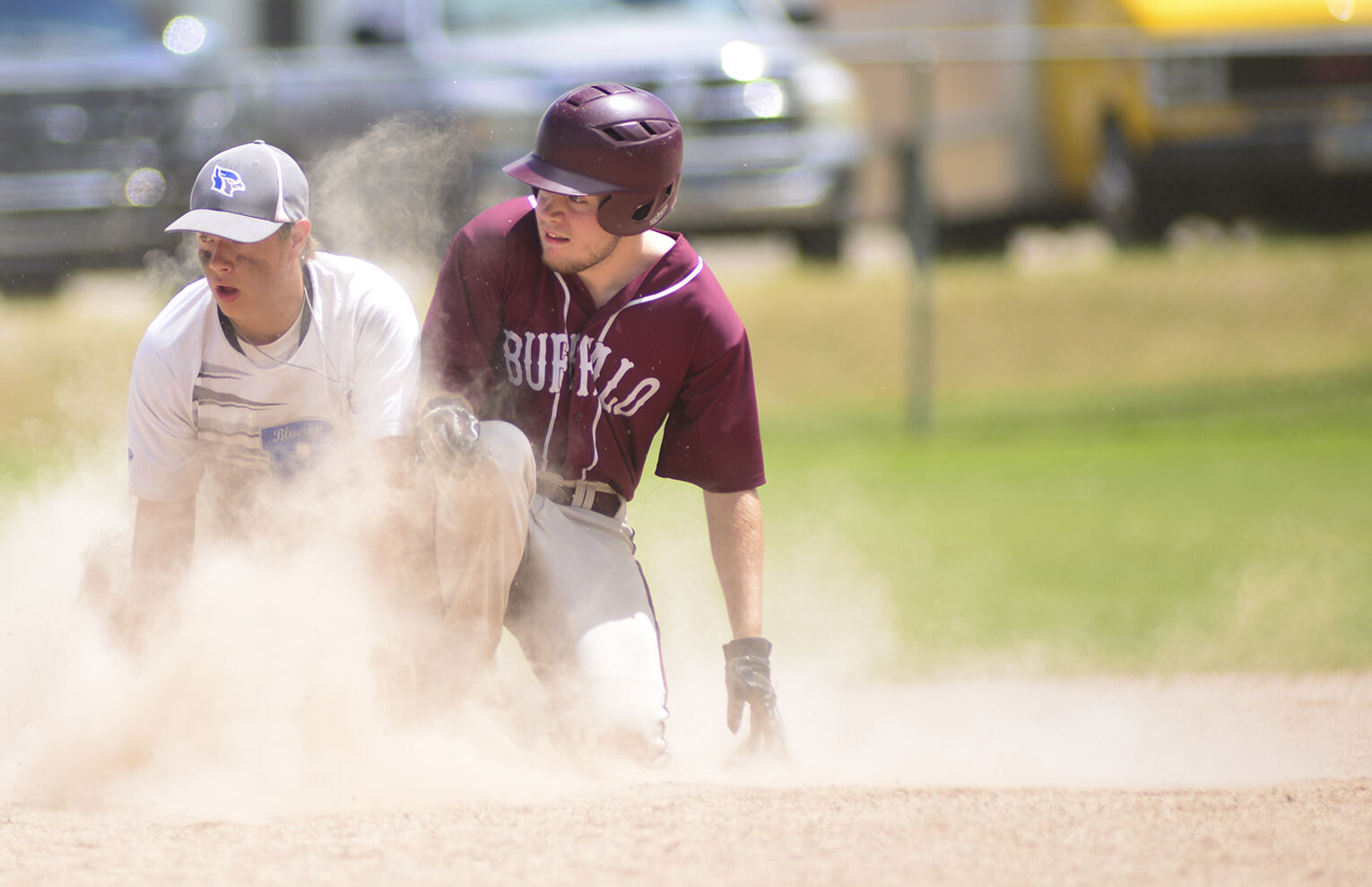 Cody Winters watches the ball pass him and second base after the catch